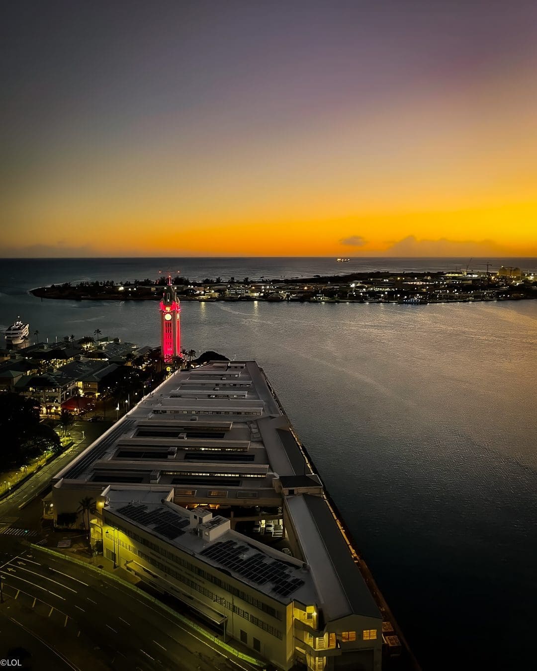 Picture Aloha Tower lit in Maui Pink. Phot credit to Lost on Lanai/Two Boldly Go. original image